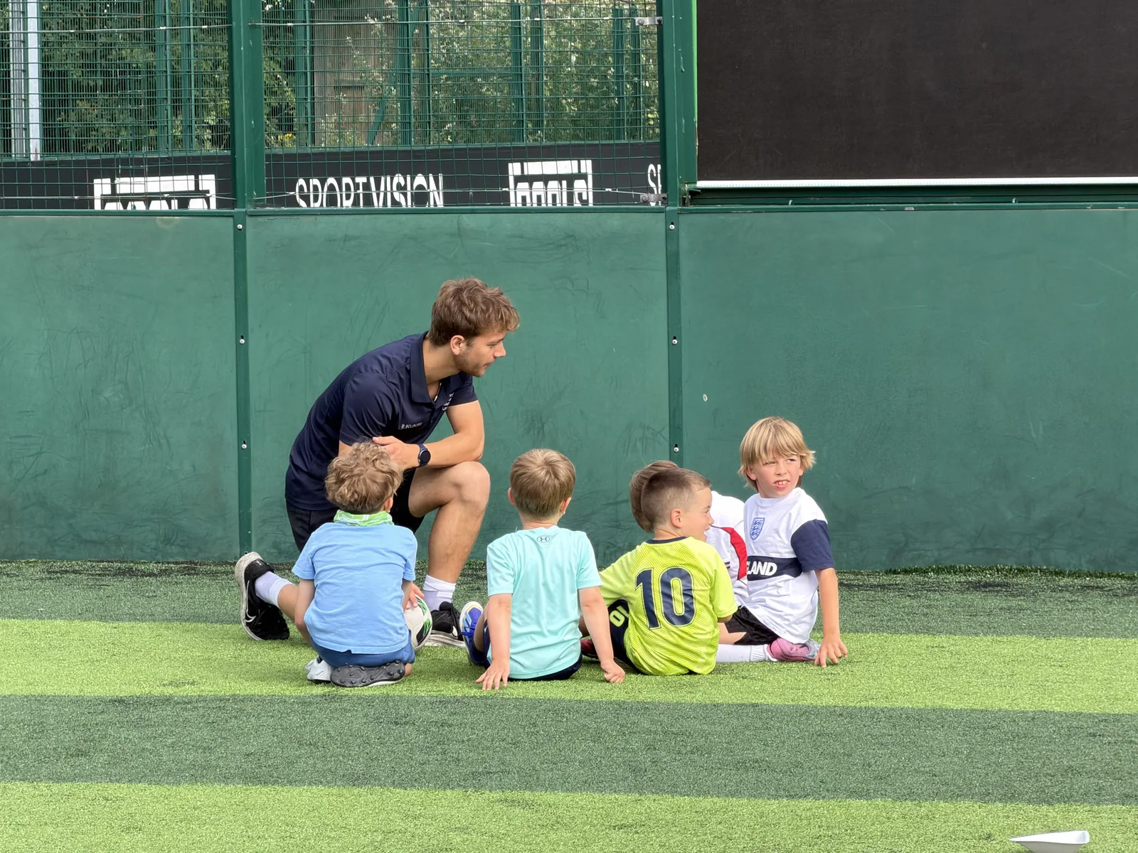 Children playing football at a Konevych FDC holiday camp